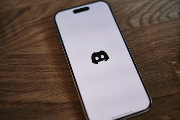 A phone showing the discord logo